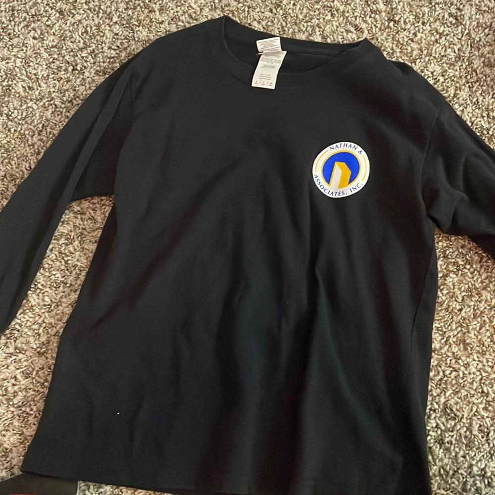 The shirt is a size is small and has been worn only one and is in great quality.